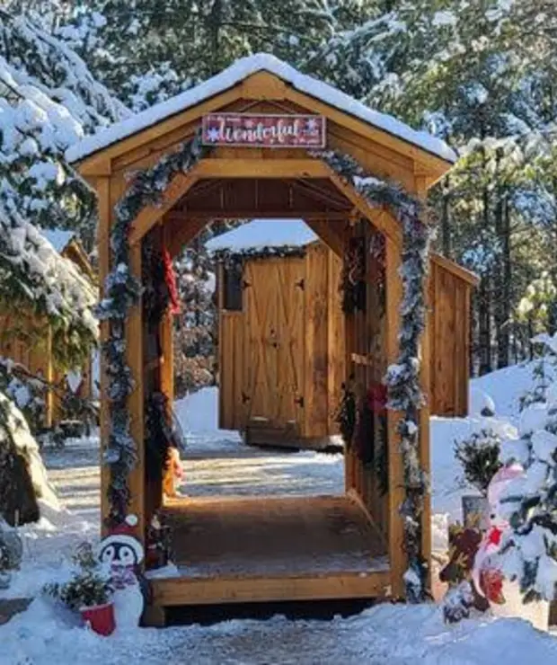 A timber market stall in the snow