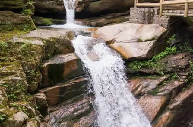 Sabbaday Falls running over granite